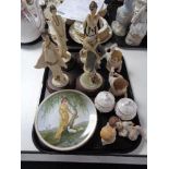 A tray of four Art Deco Italian figures on wooden stands, two wall plates,