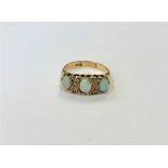 An antique 18ct gold opal and diamond ring,