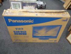 A boxed Panasonic Vierra 32 inch lcd tv