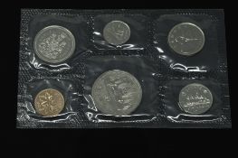 The Canadian Mint - A set of uncirculated coins to include Dollar, 50 cents, 25 cents, 10 cents,