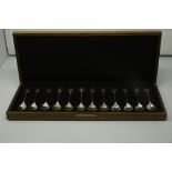 A set of twelve silver teaspoons issued by John Pinches for the Royal Society for the Protection of