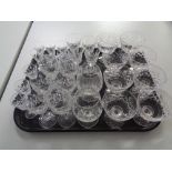 A tray of glass, crystal,