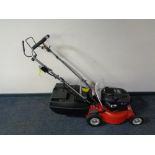 A Briggs and Stratton Rovier self propelled petrol lawn mower