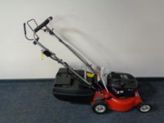 A Briggs and Stratton Rovier self propelled petrol lawn mower