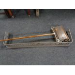 An antique copper fire curb together with a vintage Ewbank carpet sweeper