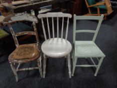 A painted Ibex kitchen chair together with two further painted chairs