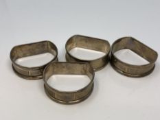 A set of four silver napkin rings, Birmingham marks CONDITION REPORT: 46.