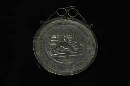 A Bank of Sierra Leone 10th Anniversary one Leone coin in pendant mount.