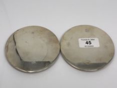 A pair of silver bottle stands,