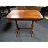A mahogany occasional table with understretcher