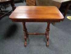 A mahogany occasional table with understretcher