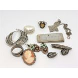 A collection of silver jewellery including rings,