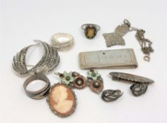 A collection of silver jewellery including rings,