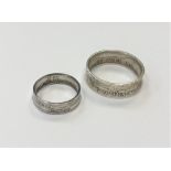 A Victorian 1888 shilling ring, size P, and large 1918 half crown ring,