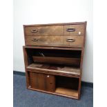 A mid century three piece ladderax bookcase with brackets