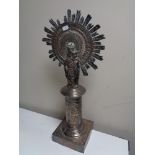 A copper plated altar centre piece