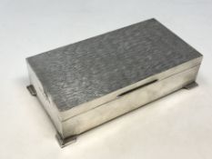 A good quality silver cigarette box,