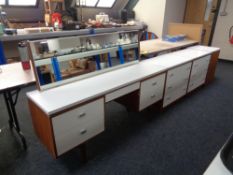 A four piece mid century William Lawrence bedroom suite comprising of knee hole dressing table,