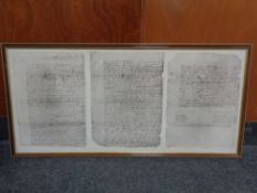 A framed print of an antique document photo copy of the last Will of William Shakespeare