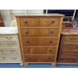 A twentieth century five drawer chest