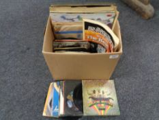 A collection of various 45 RPM vinyl singles,