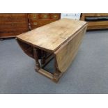 A nineteenth century oak gateleg table