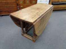 A nineteenth century oak gateleg table