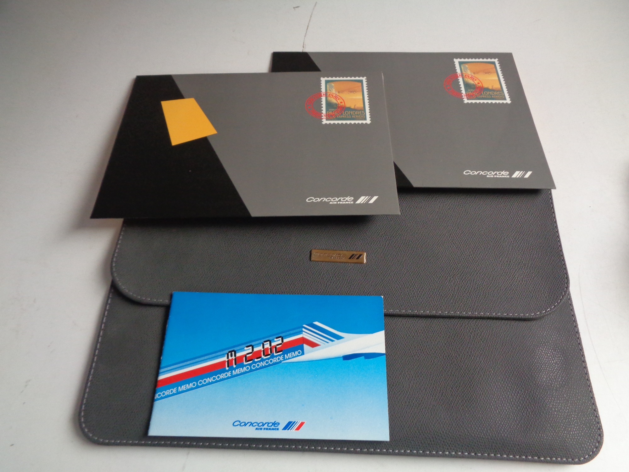 A Concorde leather folio containing ephemera, postcards, writing paper, - Image 2 of 2