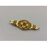 An antique ornate 15ct gold brooch CONDITION REPORT: 3.