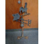 A cast iron cockerel weather vane