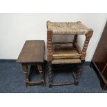 An oak stool together with two further antique rush seated stools