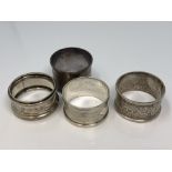 Four assorted silver napkin rings CONDITION REPORT: 71.