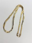 An Italian 9ct three-tone gold necklace, length 46cm CONDITION REPORT: 9.