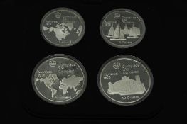 The Royal Canadian Mint - Olympic silver coin proof set comprising of two $5 and two $10 coins.