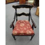 A late nineteenth century hand painted armchair