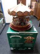 A boxed Mr Christmas electric marquee grand carousel with certificate CONDITION REPORT: