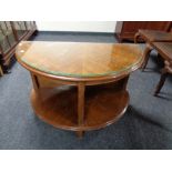 A mid century oak demi lune two tier table