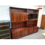 A mid century Danish twin section bookcase fitted with cupboards