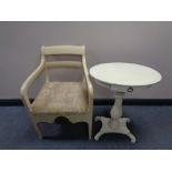 A nineteenth century painted pedestal occasional table together with a painted armchair