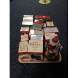 A tray of fourteen Enesco Treasury of Christmas ornaments (boxed),