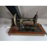 An early twentieth century hand sewing machine