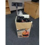 A boxed Vax vacuum cleaner with accessories