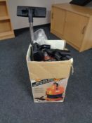 A boxed Vax vacuum cleaner with accessories