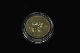 The Royal Mint - A Hong Kong $1000 coin, Lunar Year of the dog 1982, 22ct gold 15.98g.