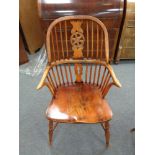 An elm Windsor style armchair