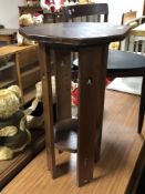An octagonal Arts and Crafts plant stand