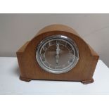 An oak cased Enfield mantel clock