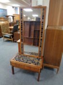 A mid century Danish tiled low table fitted with two drawers and matching wall mirror