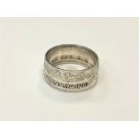 A Canadian half dollar 1940 ring,