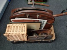 A box of leather holdall, bed warming pan, two wooden lawn bowls,
